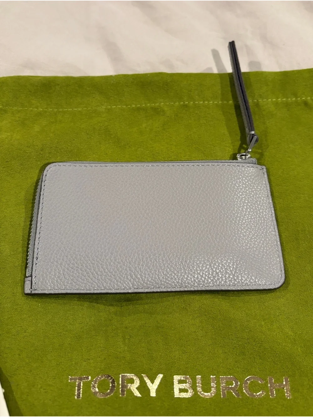 Tory Burch Light Gray Pebbled Zip Card Case with Metallic Stripe Accents